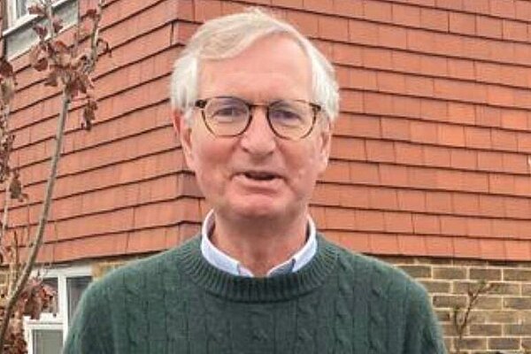 Head and shoulders picture of Daniel Stewart Roberts, with glasses and grey hair.