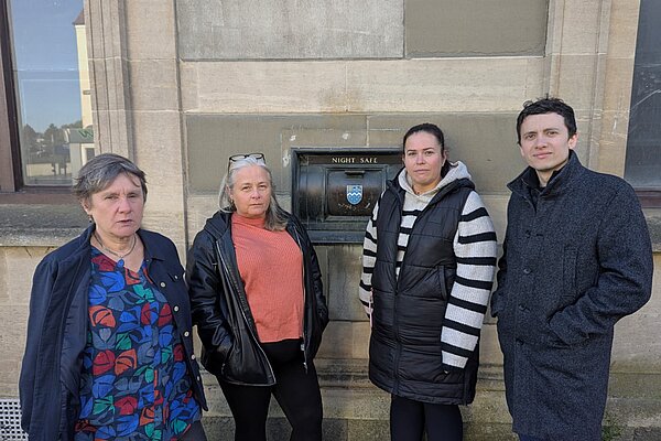 Newhaven Councillors at a hole-in-the-wall in Newhaven Town Centre - the last remnants of banking
